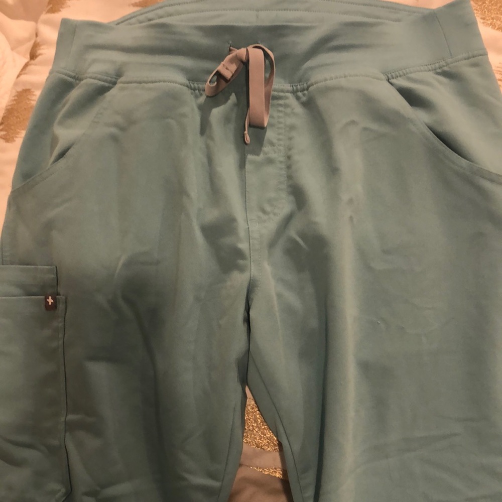 FIGS Kade pants in sea glass color
